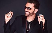 Johnny Mack as George Michael